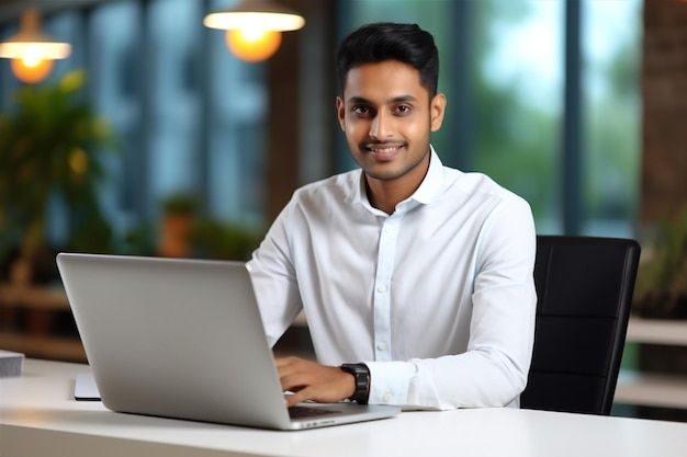 entrepreneur laptop males happy office happiness technology job young businessman men indian smile sitting premium ai generated image